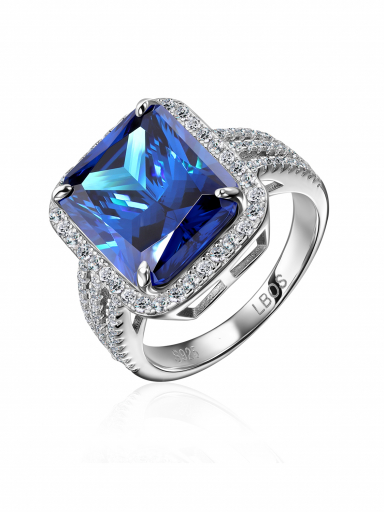 Серебряное кольцо 925 пробы синее с белыми фианитами